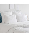 Oreiller Sensation duvet Alpes blanc dans une chambre