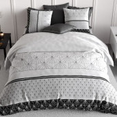 Parure de lit 240x260 cm Casta avec imprimés graphiques d'éventails noirs et blancs pour lit moderne.