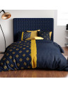 Housse de couette Nil 240x220 cm avec motifs fleurs et écailles bleu nuit et or ocre.