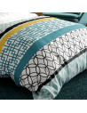 Housse de couette Citedor format 260x240 motifs cercles noirs et losanges turquoises pour grand lit double.